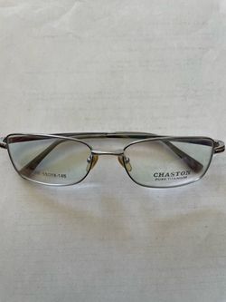 Chaston Pure Titanium Eyeglasses Frame Silver - 55-18-145 (CH010) Brand: Chaston Model: CH010 001C Material: Pure Titanium (Lightweight & Dura