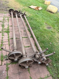 Used trailer axles two of them come with drums two of them come without drums with leaf springs $400 or best offer pick up only they’re 9’6” long