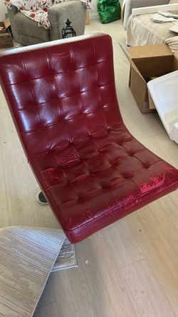 Red Swivel Chair Must Go 