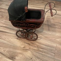 Antique doll baby buggy