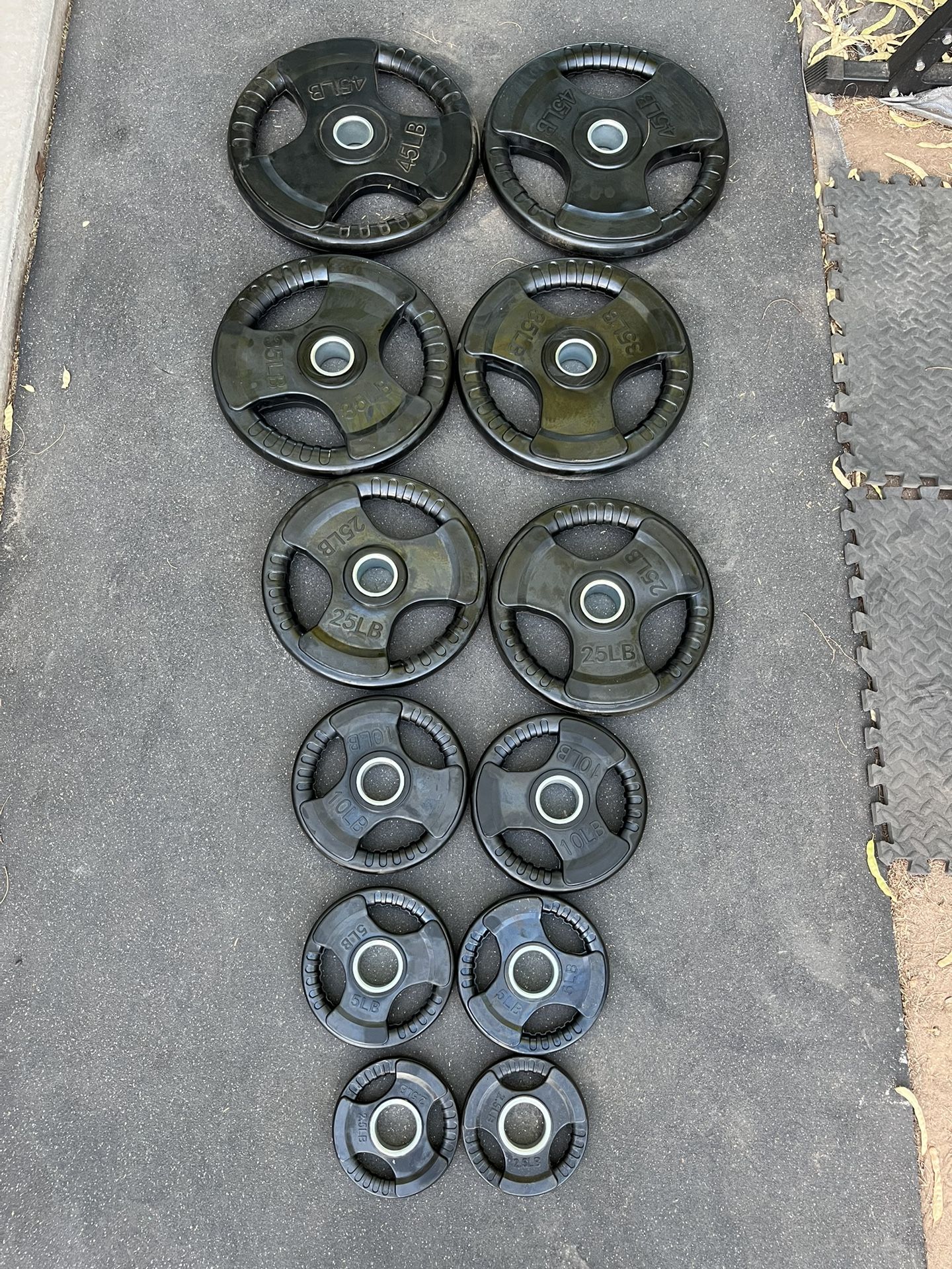 245lb Olympic Weight Plate Set Rubber Coated