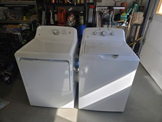 GE 4.2 cu. ft top load washer and 7.0 cu ft electric front load dryer