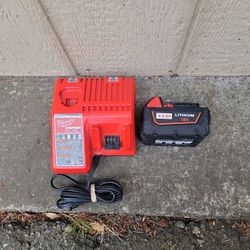 MILWAUKEE 12V-18V CHARGER AND 1 18V 8AH AFTERMARKET BATTERY