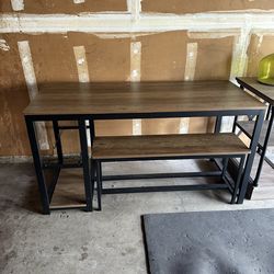 Dining table with wine rack and benches