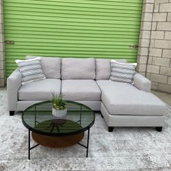 *Free Delivery* Gray Living Spaces Sectional Reversible Chaise