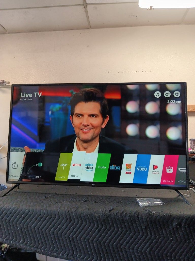 65 inch LG 4k smart tv really nice tv comes with remote shows great picture works perfect guaranteed