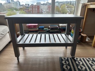 Multi use table with wheels