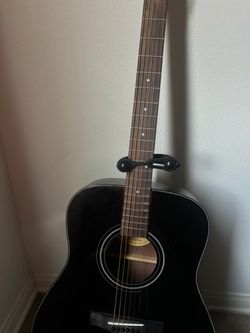 Black acoustic guitar