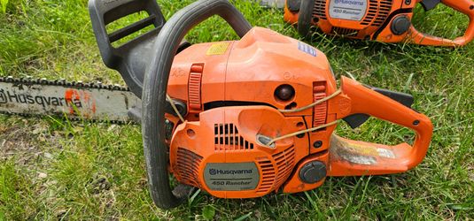 2 Husqvarna chainsaws