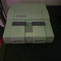 Original Super Nintendo And Controllers And Game Cartridges