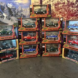 1:43 Scale Road Champs Diecast Trucks. Some include Gas Pumps & Display Case. New Unopened.