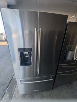 KitchenAid Refrigerator with wooden shelves