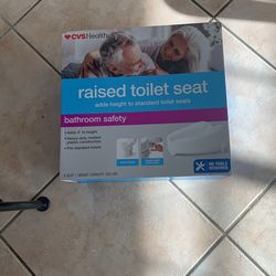 Brand New Raised Toilet Seat