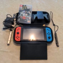 Nintendo Switch Plus One Game Used Excellent Working Condition.