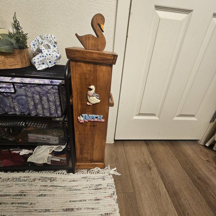 vintage toilet paper storage cabinet