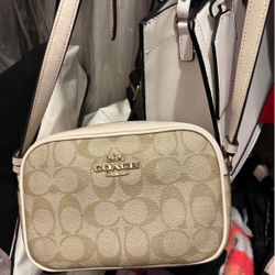 Nude Coach purse crossbody 