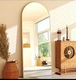 A Full-Length Mirror Measuring 59"X16", Arched Design