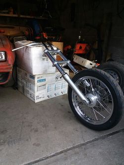 Front end... complete front end off of a 2013 Harley dyna with T bars. Brake caliper, front spoke rim and rotor. $500