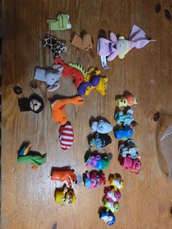 Variety of finger puppets, plastic and fabric. All for $5