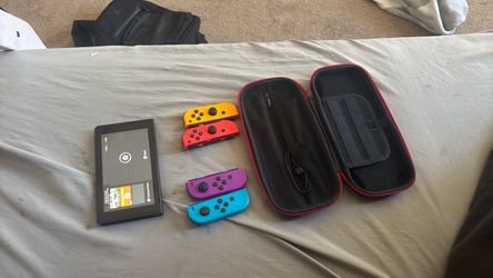 Nintendo Switch + 4 Joy Cons + Case — $150 OBO