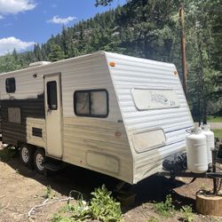 Travel Trailer $3,150.00 Not pretty, but works.