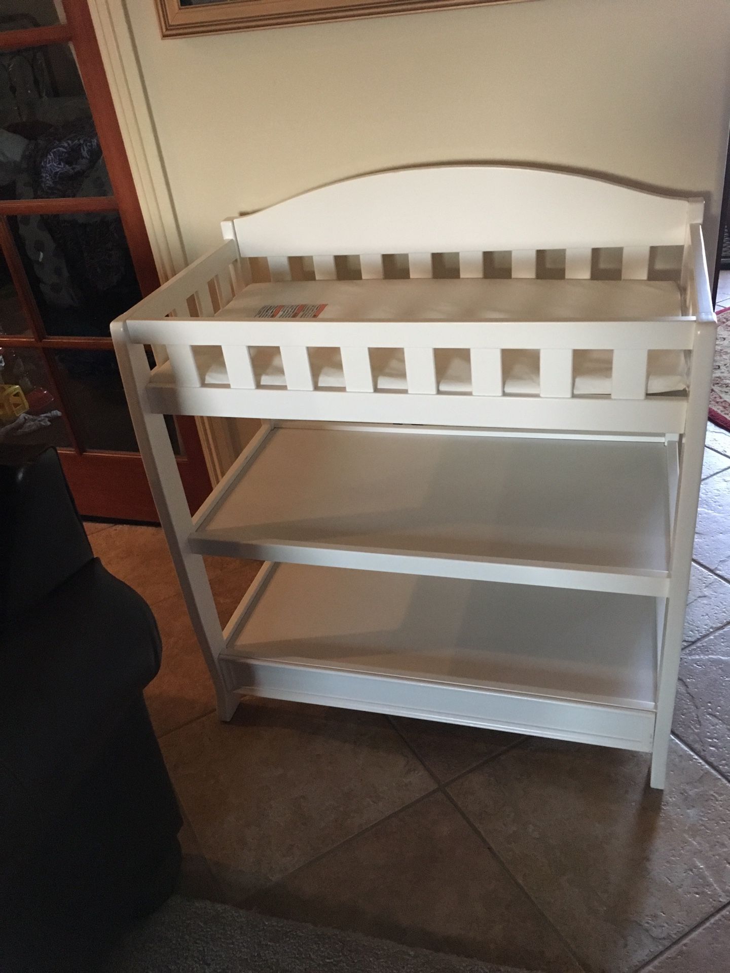 Brand new changing table with pad