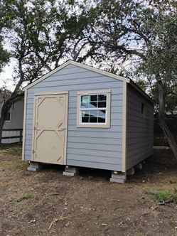 12x16 gable shed with 2 windows and ac opening (built on site )