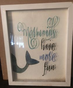 Glass framed mermaid picture