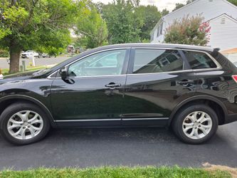 2011 Mazda CX-9 SUV black, 3.7 V-6 engine, Automatic, AWD, 3rd row seating, all power, 184,700 miles, heated seats, Car play android am-fm radio bluet