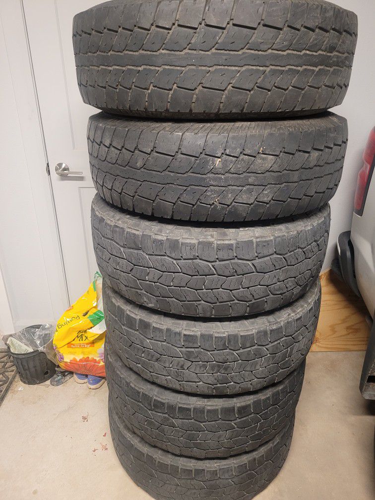 Full Set Of Chevy 18s And Two Extra Tires