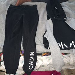 Assorted Joggers And Scrubs And Women's Shoes 