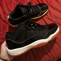 Jordan 11 Retro Low Bred 
