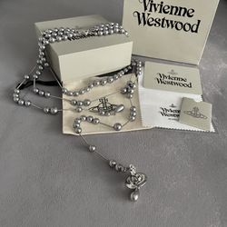 Vivienne Westwood Irregular Three Row Pearl Bas Relief Choker in silver