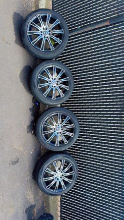 4 lug rims and tires for sale. Ready for pickup