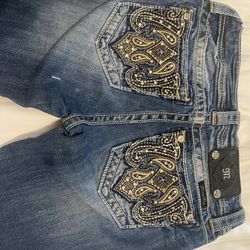Miss Me Distressed Mid Rise Bootcut Jeans