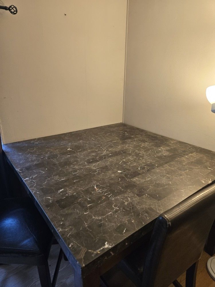 Dining Table And Four Chairs