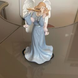 Porcelain Angel Figurine Playing Flute