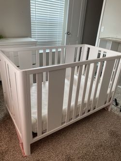 NEVER USED CRIB AND MATTRESS