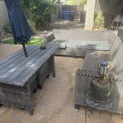 Wicker patio couch and coffee table