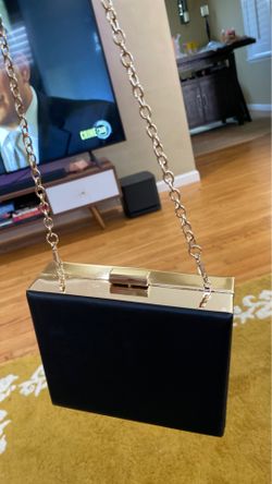 Also black and gold snap square purse