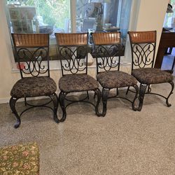 4 Chairs From Wood And Metal 
