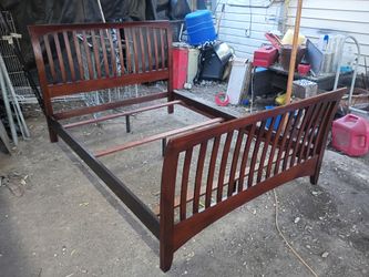 Vintage Queen size bed frame. Solid wood and sturdy.