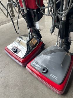 Two heavy duty commercial vacuums sanitaire