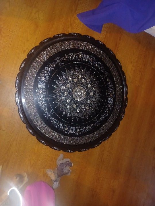 Fold out abalone wood table