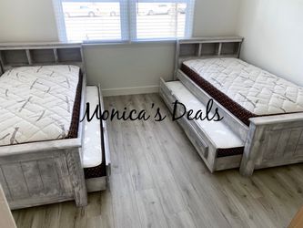2 Twin Solid Wood Beds With Twin Trundles And Mattresses $1,360
