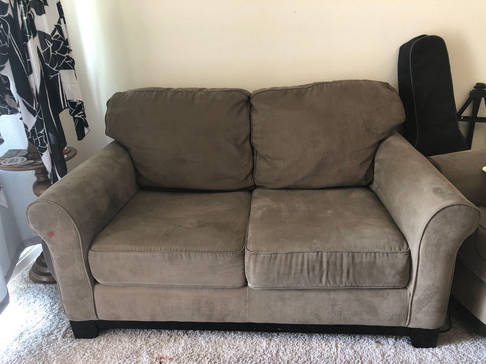 2 matching neutral color couches