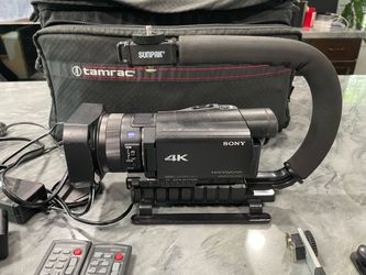 Sony FDR-AX53 4K UHD Handycam Camcorder Kit - 3 Batteries, Charger, Remotes & Accessories
