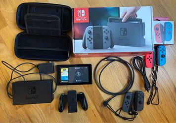 Nintendo Switch v1 unpatched/moddable complete with box, 2 joy-cons, 200GB microSD, grip, case