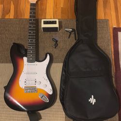Donner Electric Guitar plus Case, Amp, Capo, and Tuner
