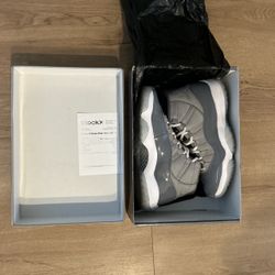 Air Jordan Cool Grey 11s.